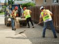 The Superior Asphalt team lays gravel and flattens it prior to paving a new driveway